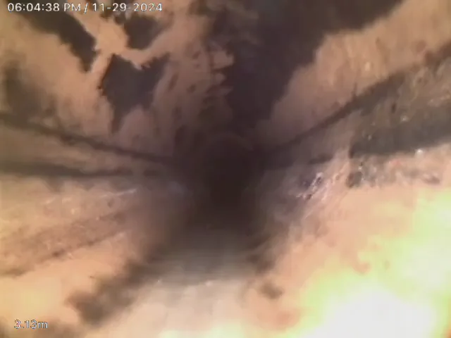 Drain camera footage showing a clearer section of the drain pipe